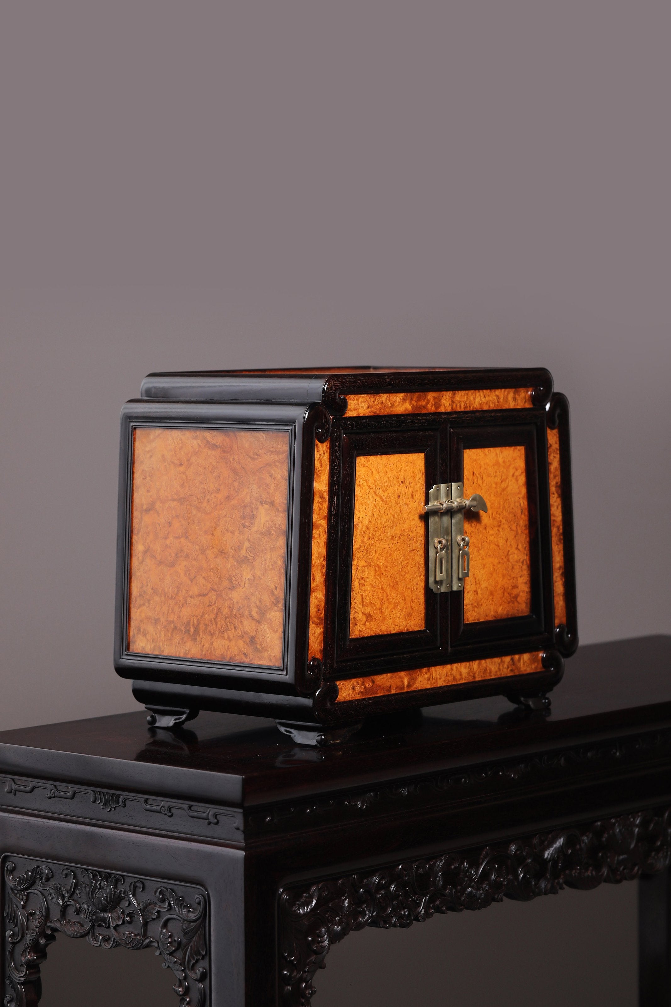 Tea box inlaid with burl wood and made of small-leaf rosewood.