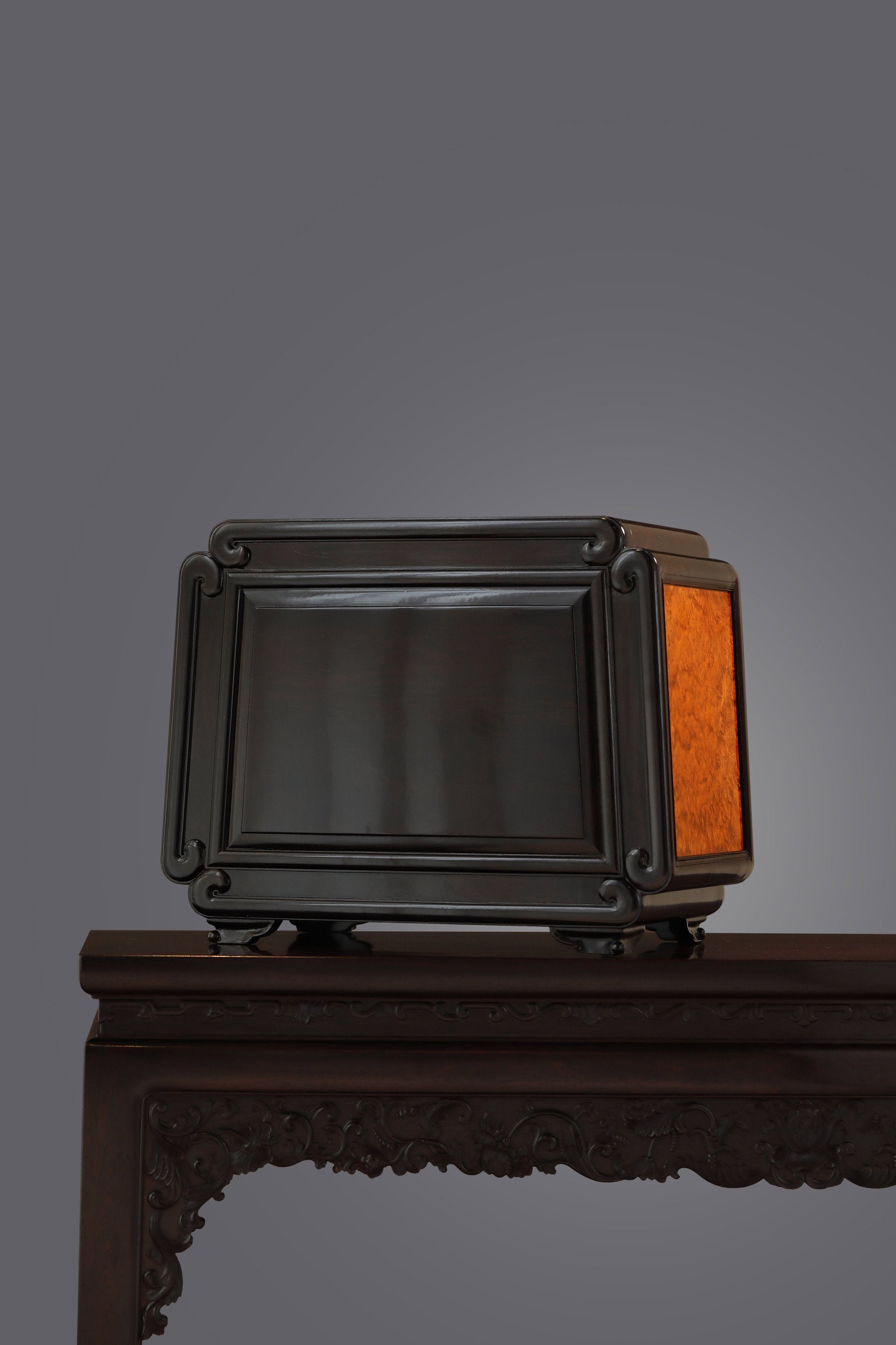 Tea box inlaid with burl wood and made of small-leaf rosewood.