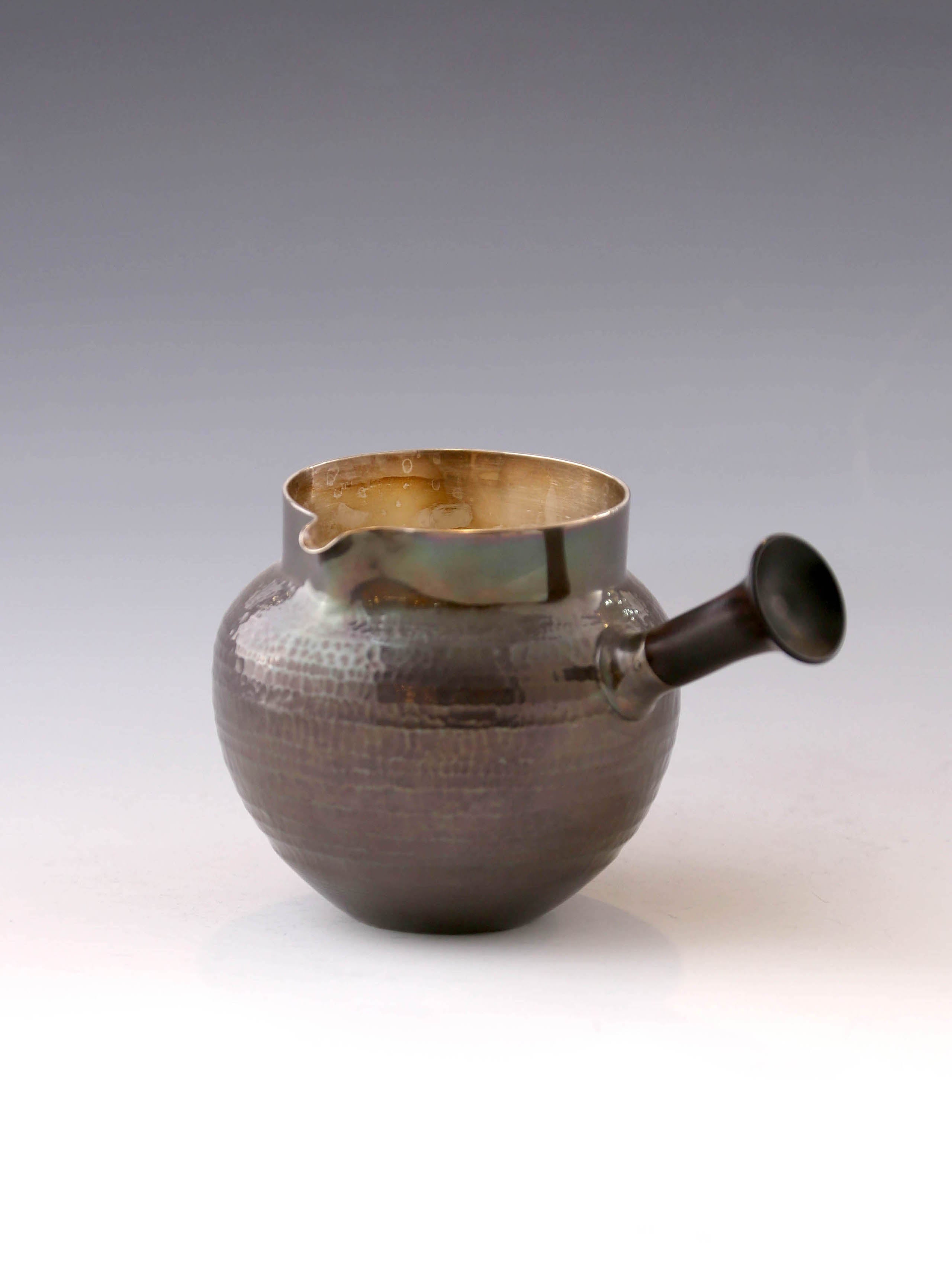 侧把回旋纹纯银公道杯