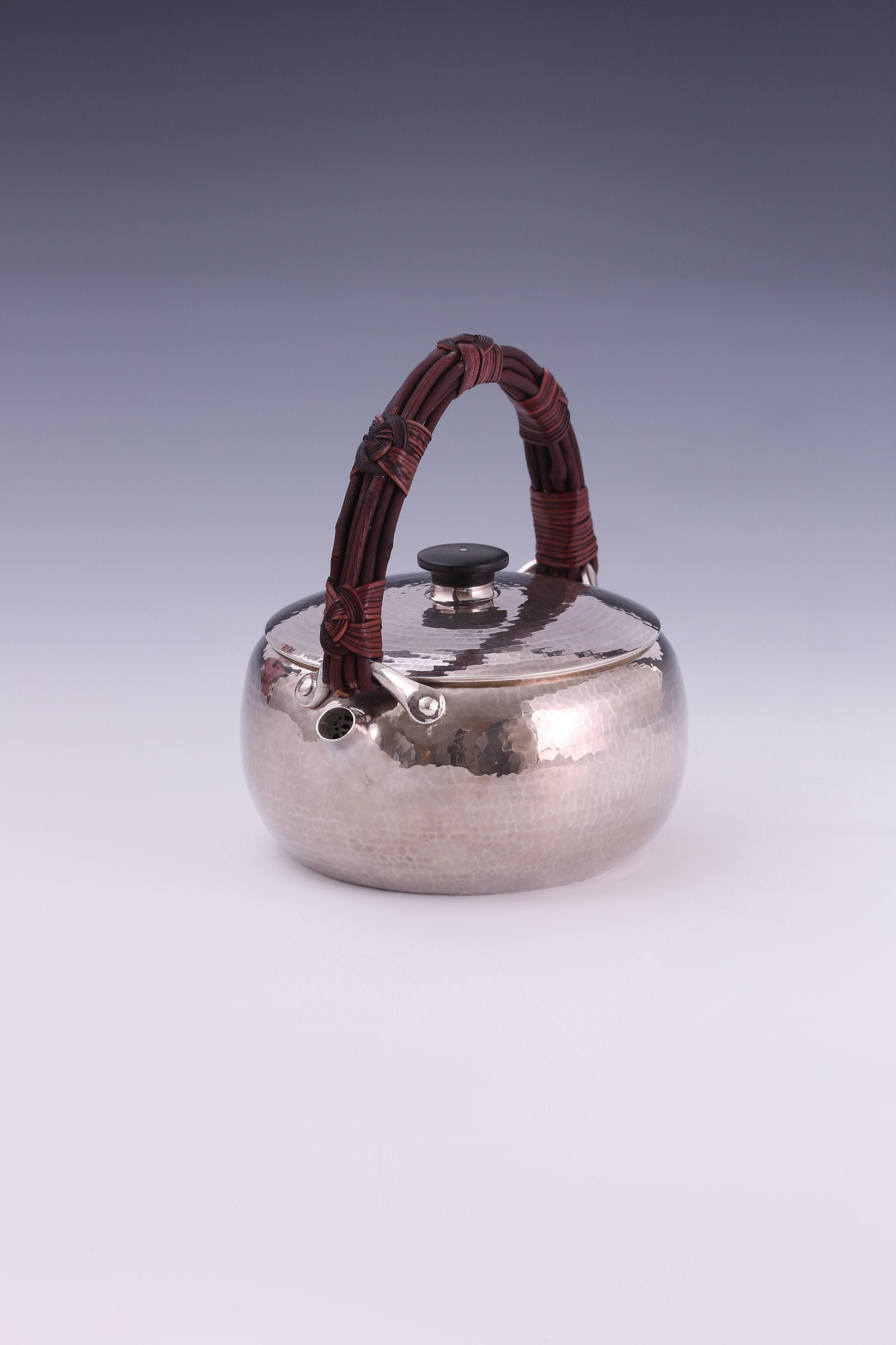 Large rattan spout, silver kettle, cast iron tea stove