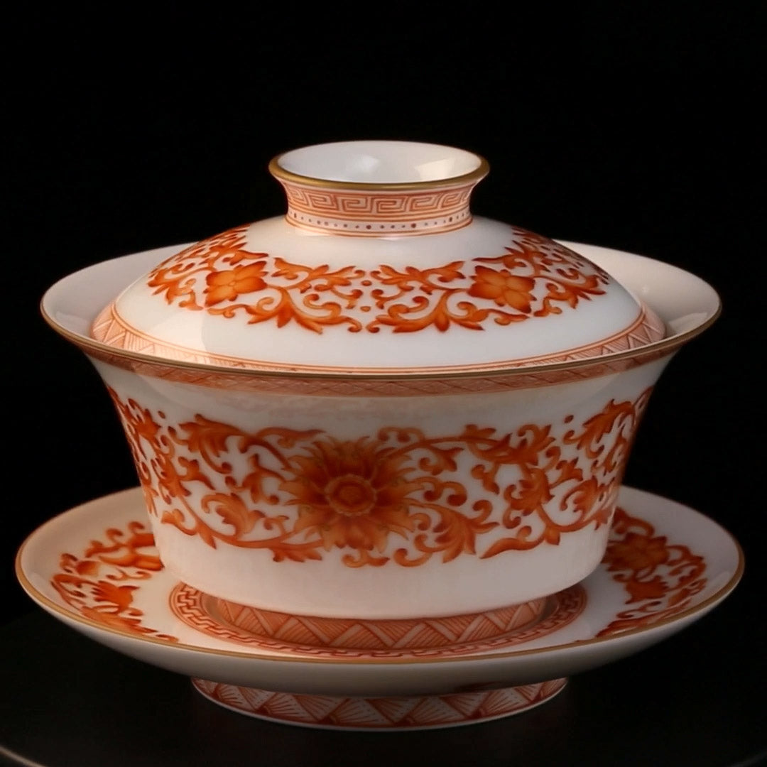 Iron-Red Lidded Bowl / Bell Cup Ground with Interlocking Lotus and Fu-Lu Motifs