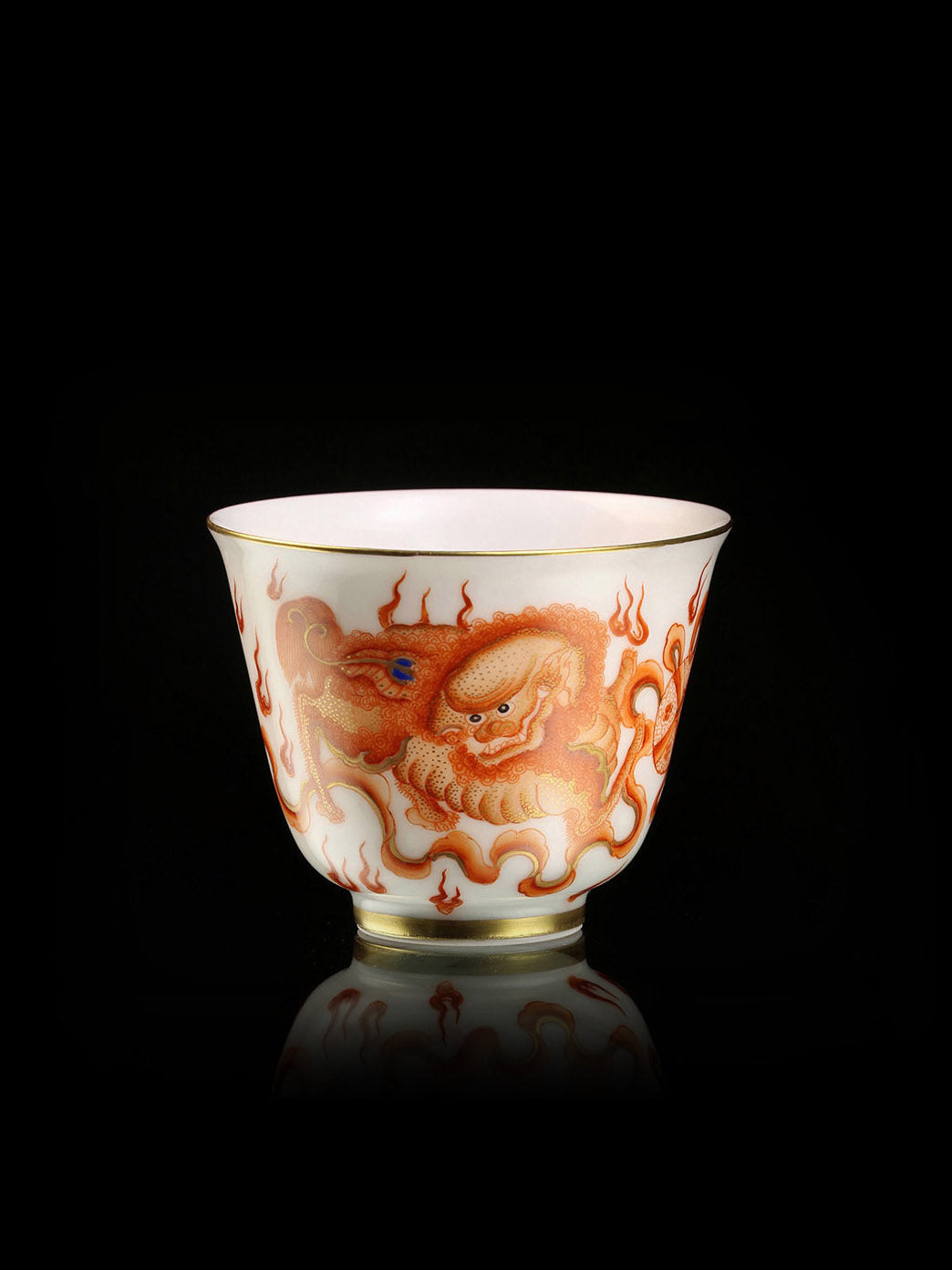 Iron-Red Tasting Cup with Gilded Lion Dance & Great Auspiciousness Motifs