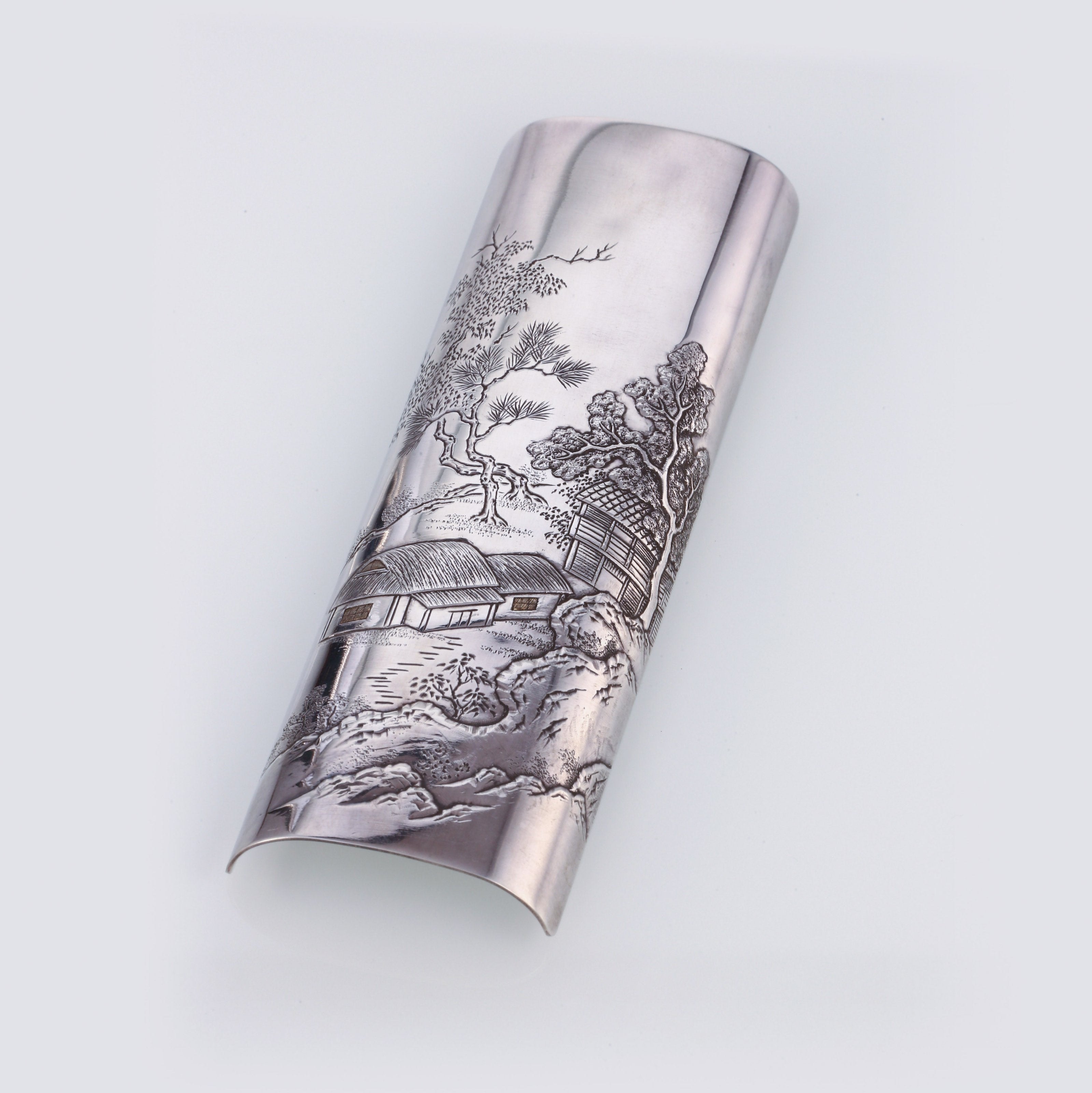 浮雕山水人家
纯银茶则