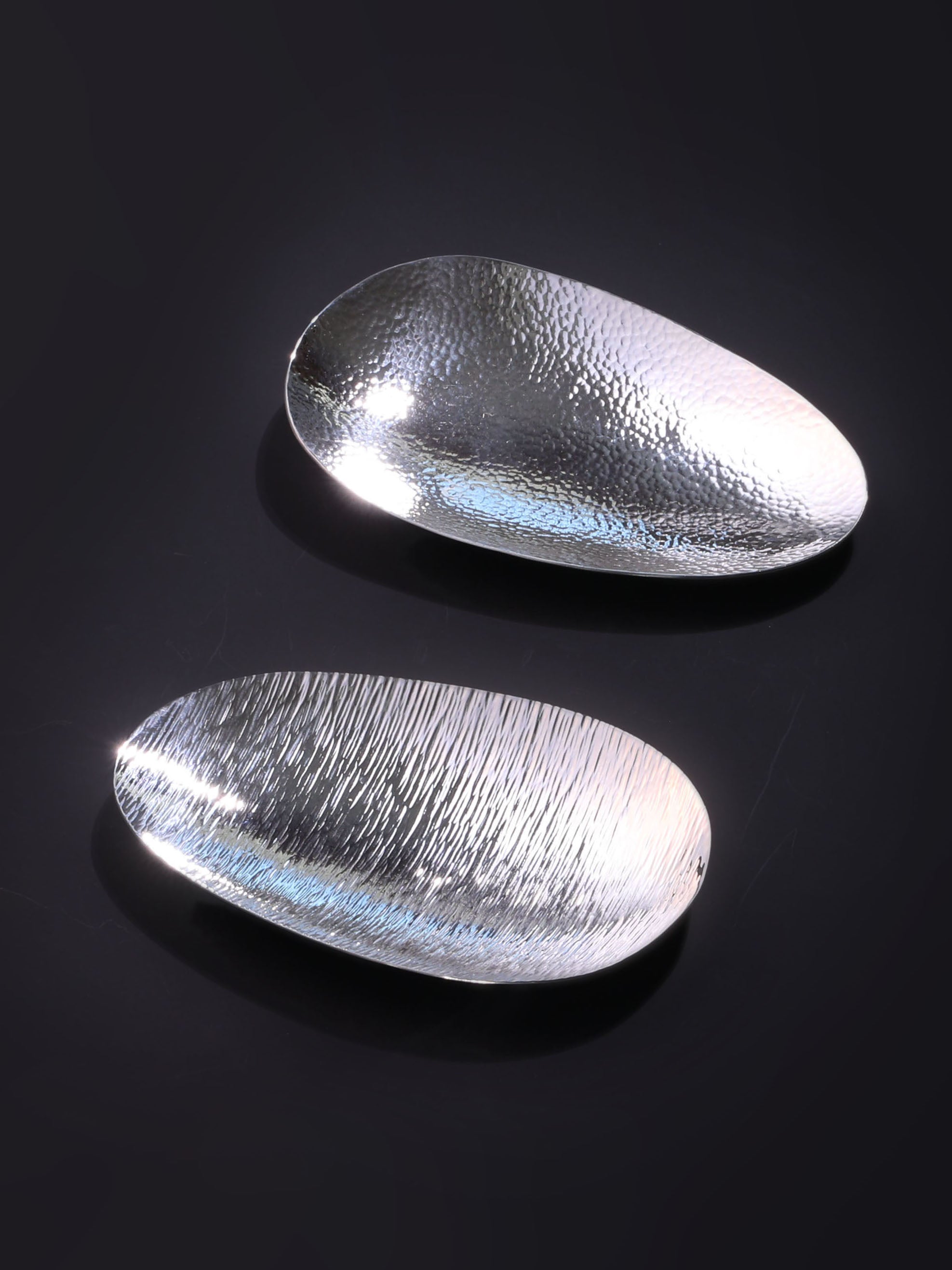 A piece of silver tea scoop