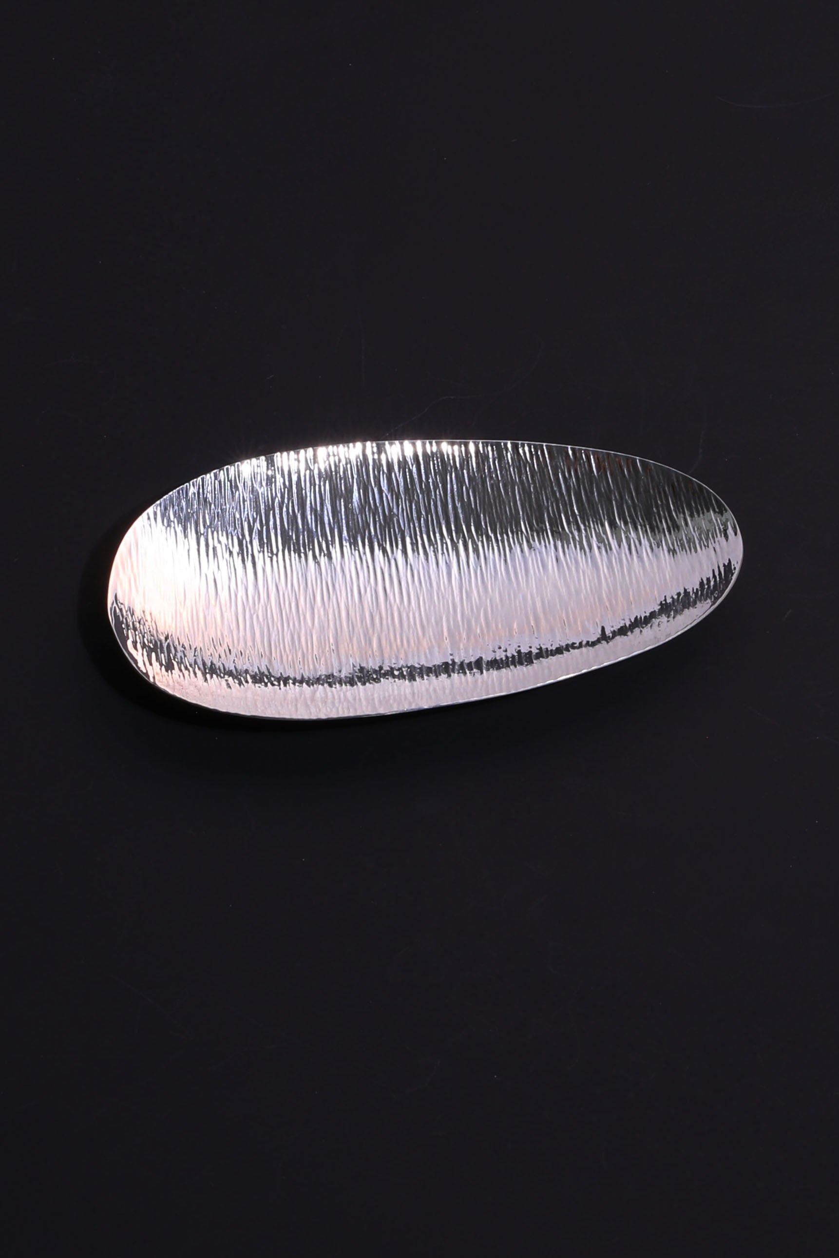 A piece of silver tea scoop