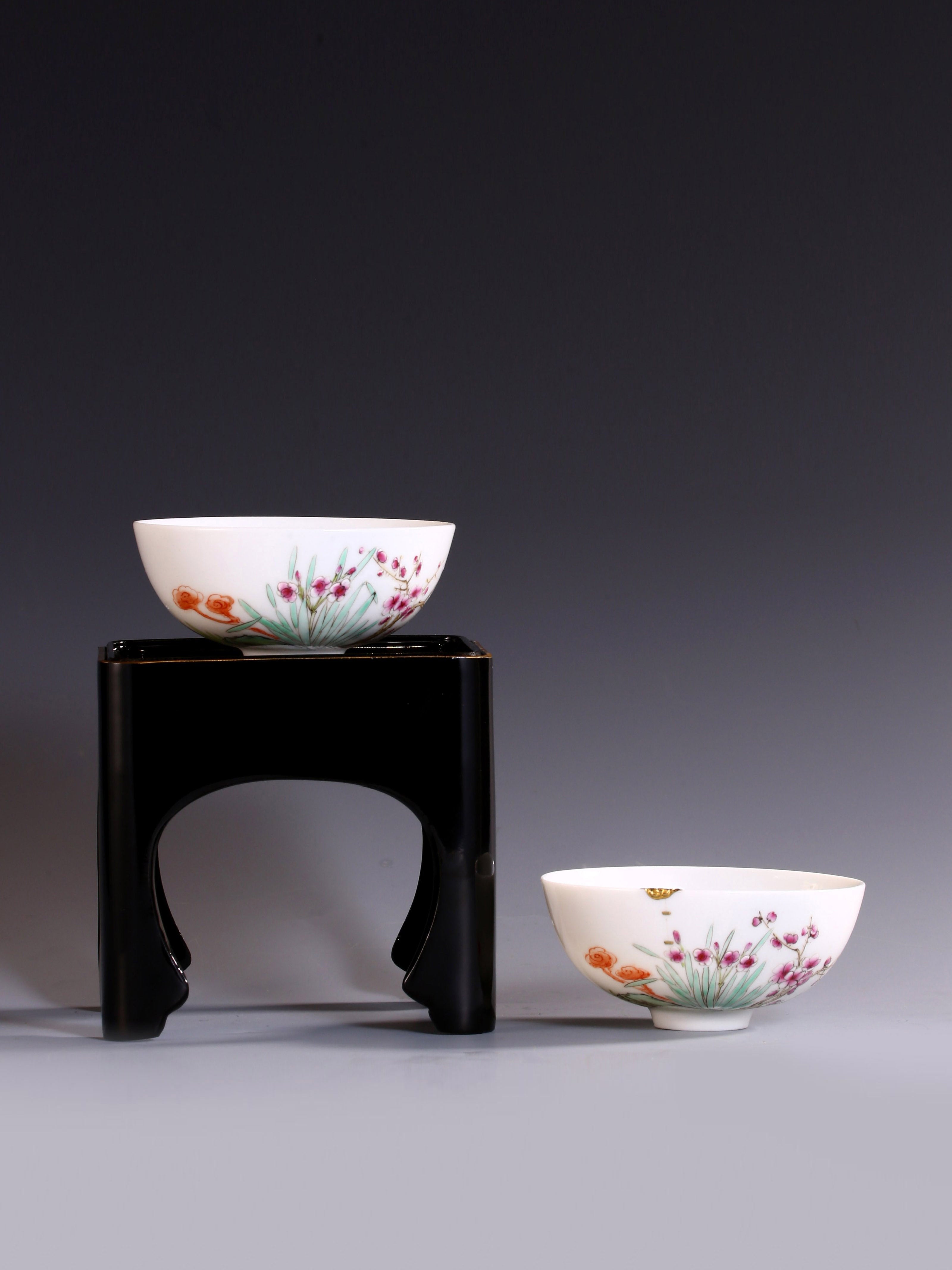 A pair of gilded famille rose palace bowls bearing the mark of the Yongzheng Emperor