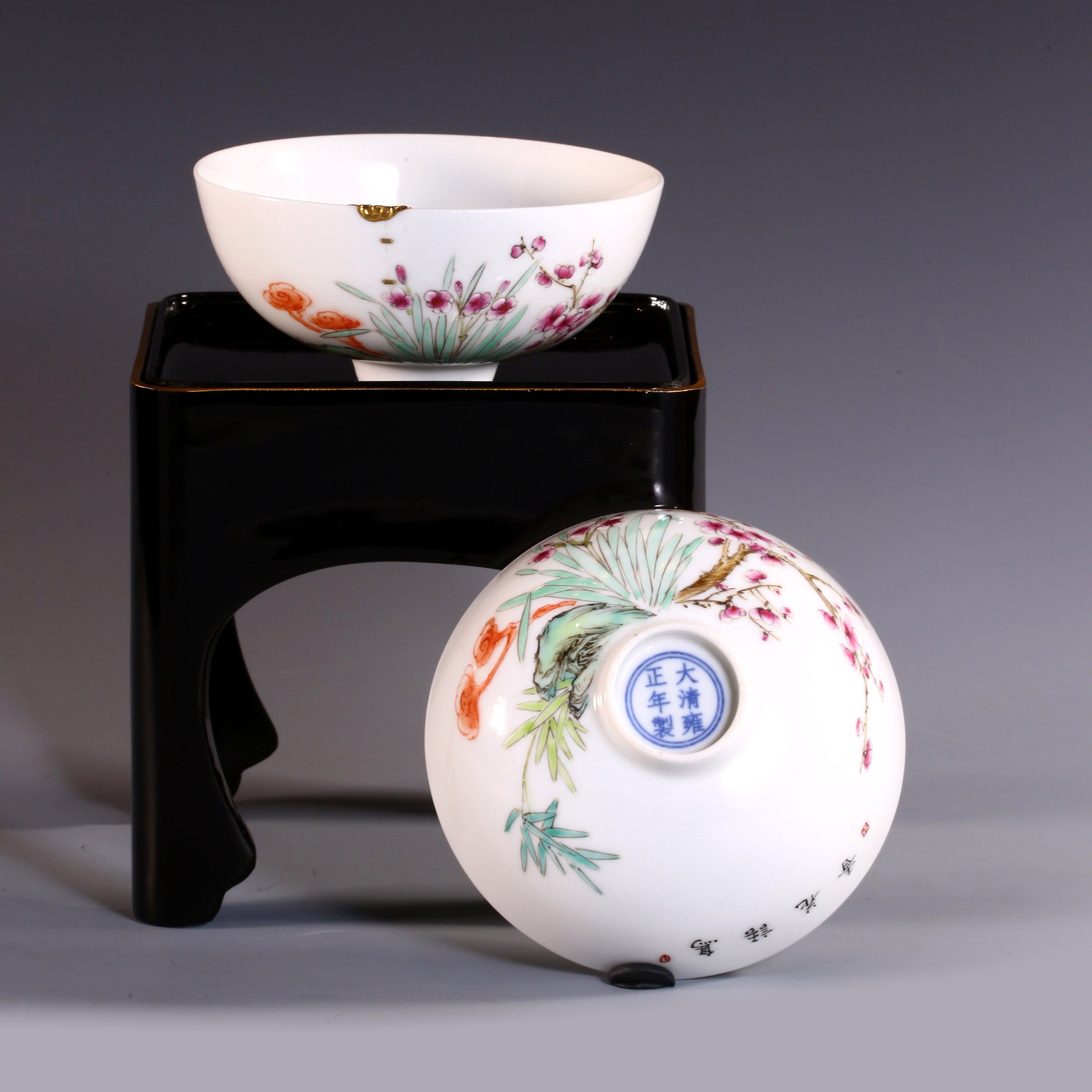 A pair of gilded famille rose palace bowls bearing the mark of the Yongzheng Emperor