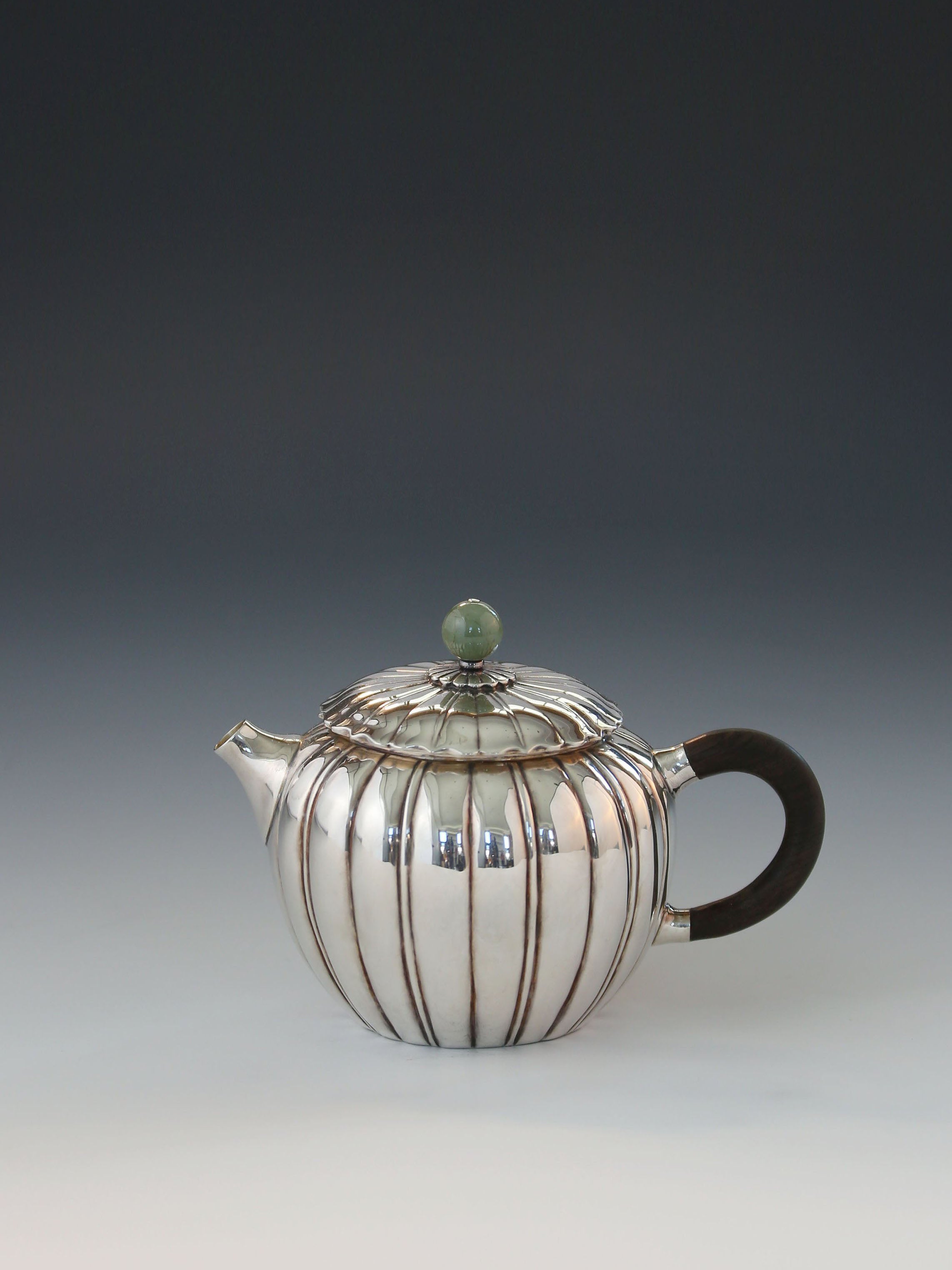 Jade-patterned sterling silver teapot