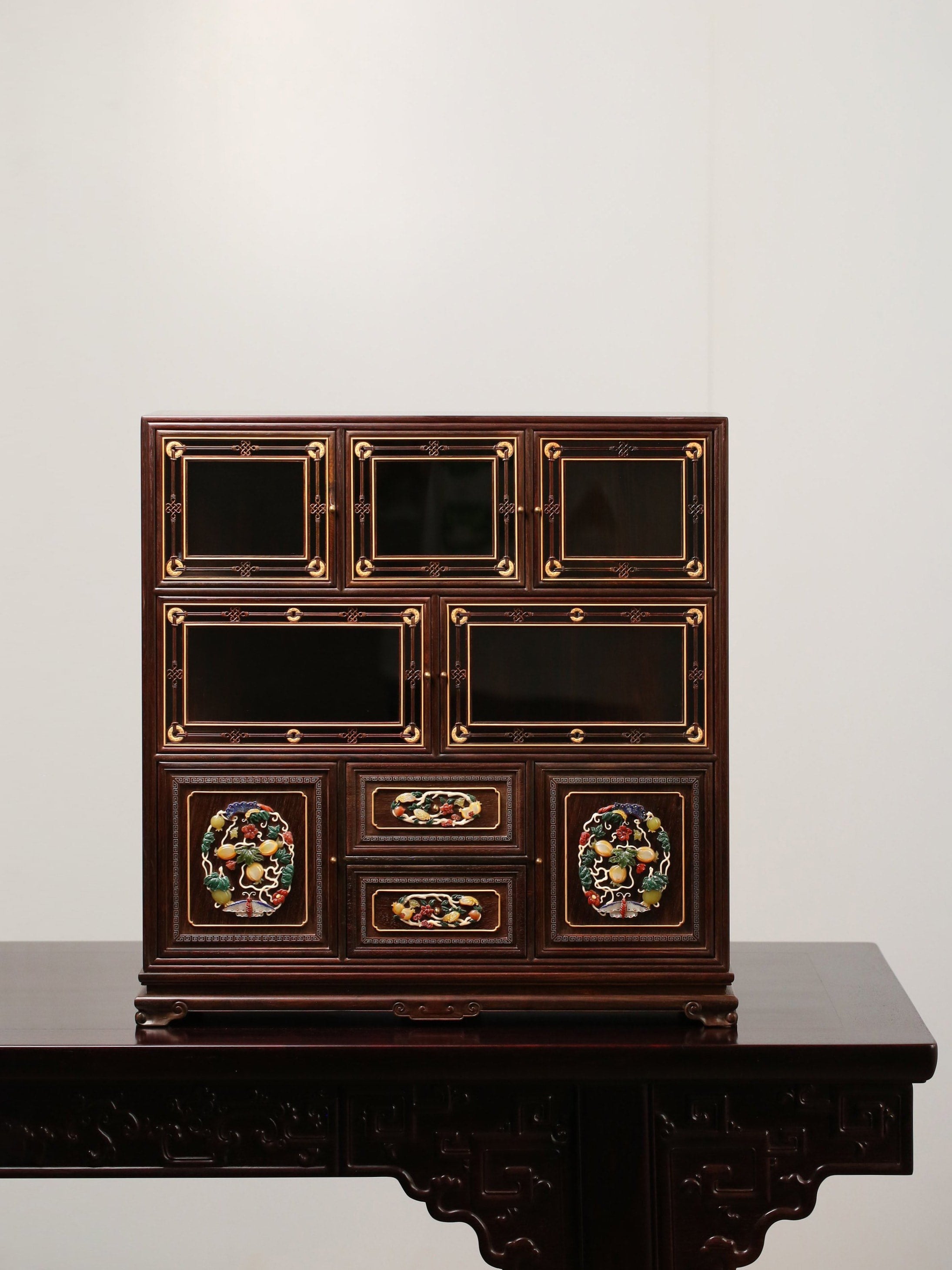 Palace replica of a multi-treasure cabinet with melon and butterfly patterns