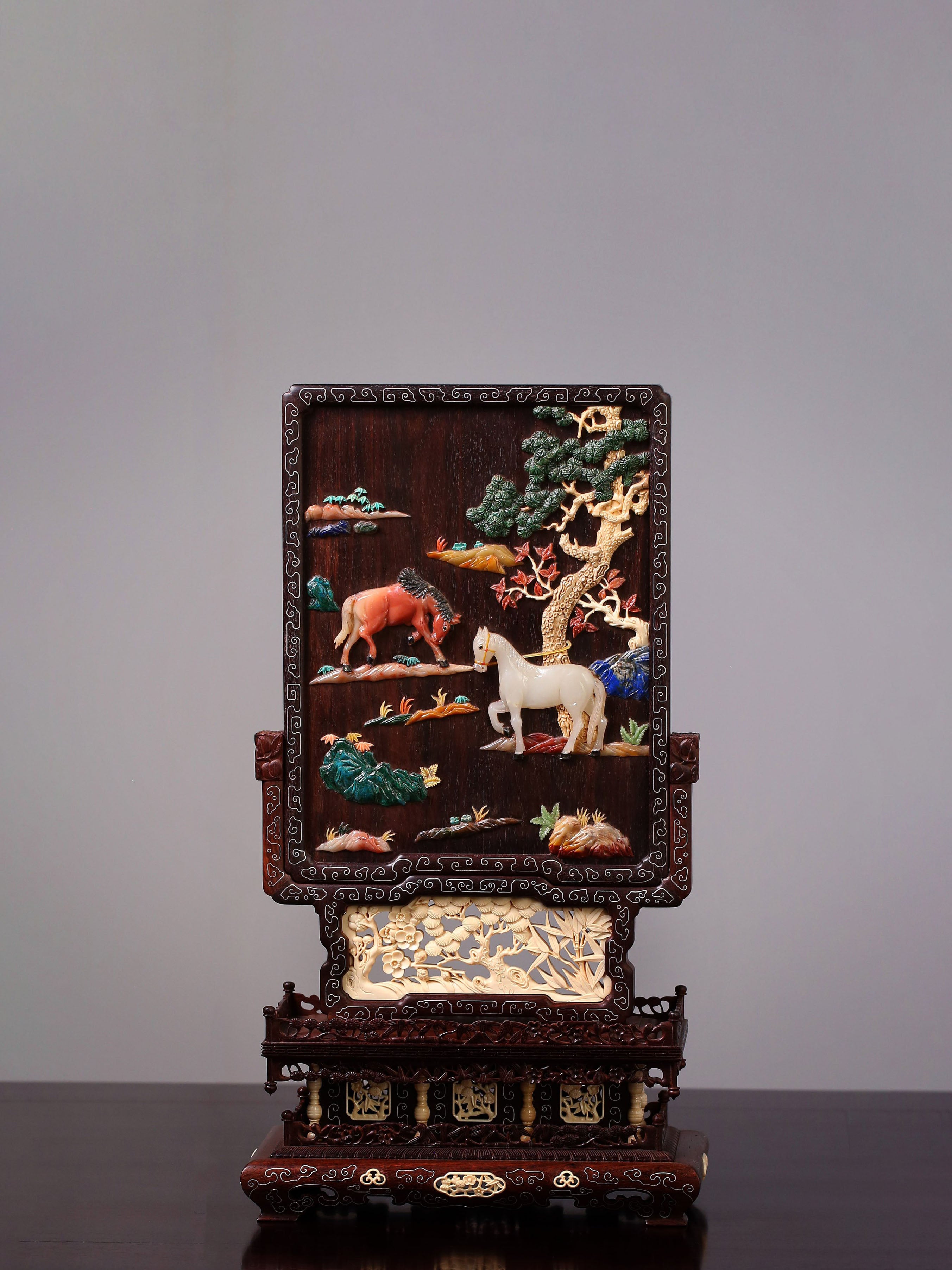 Rosewood screen inlaid with precious stones and silver filigree