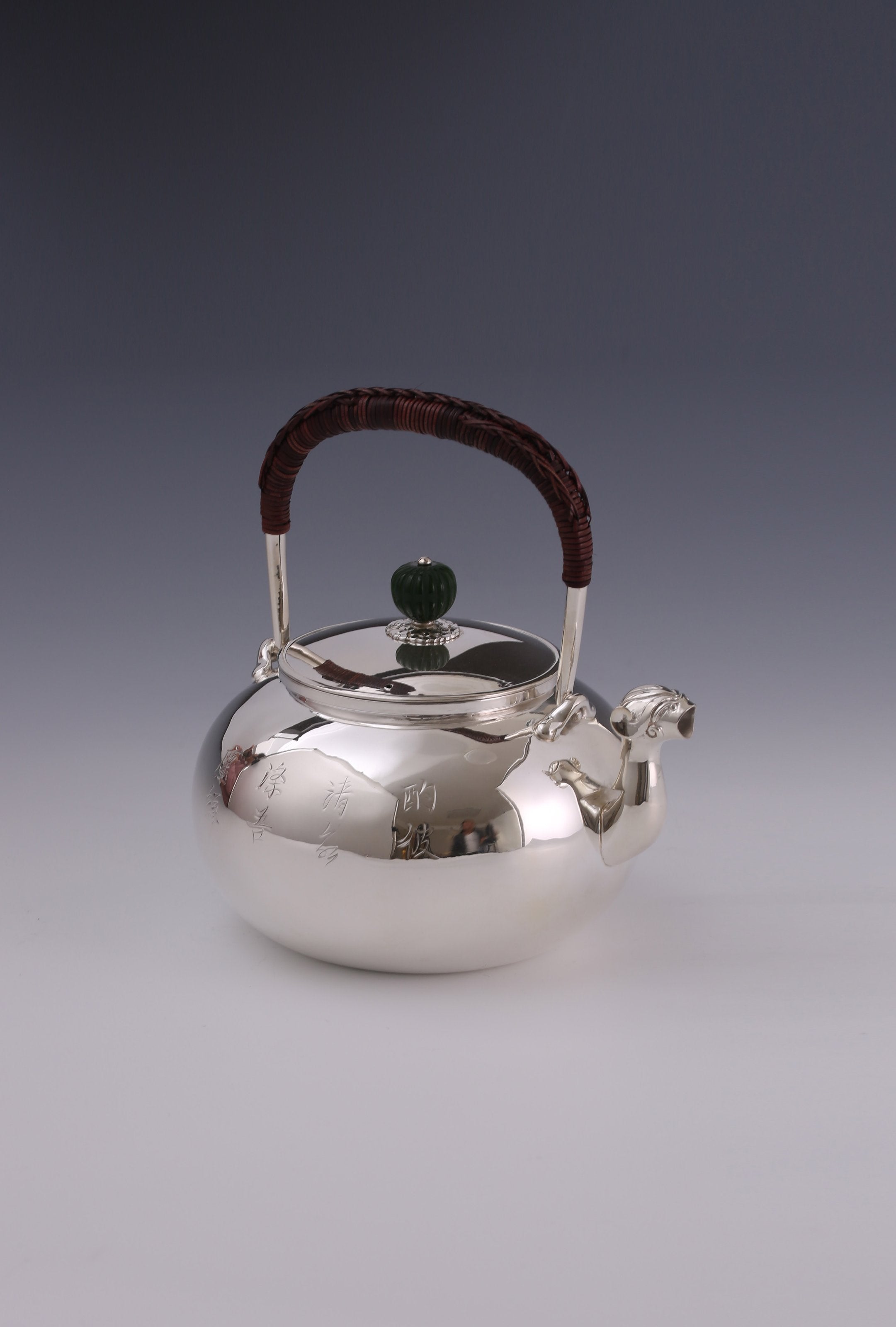 Plain silver ewer with animal-shaped mouth