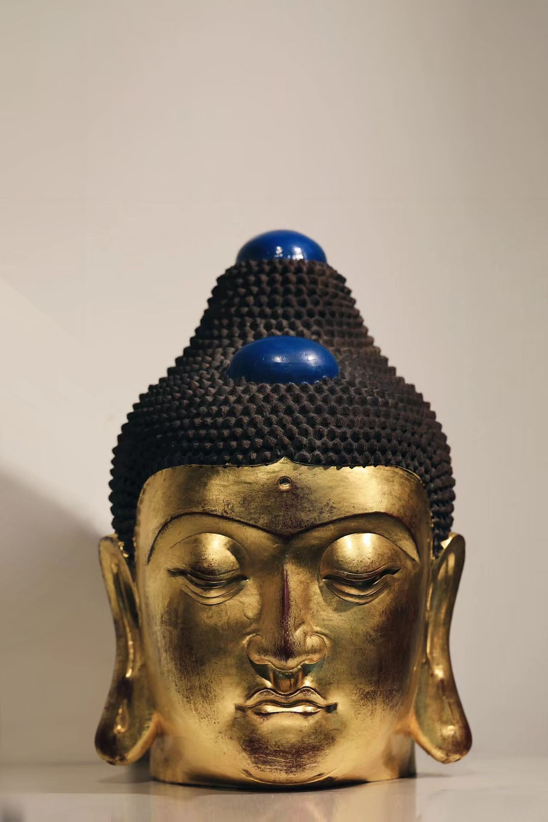 Ebony and Gold Leaf Buddha Head