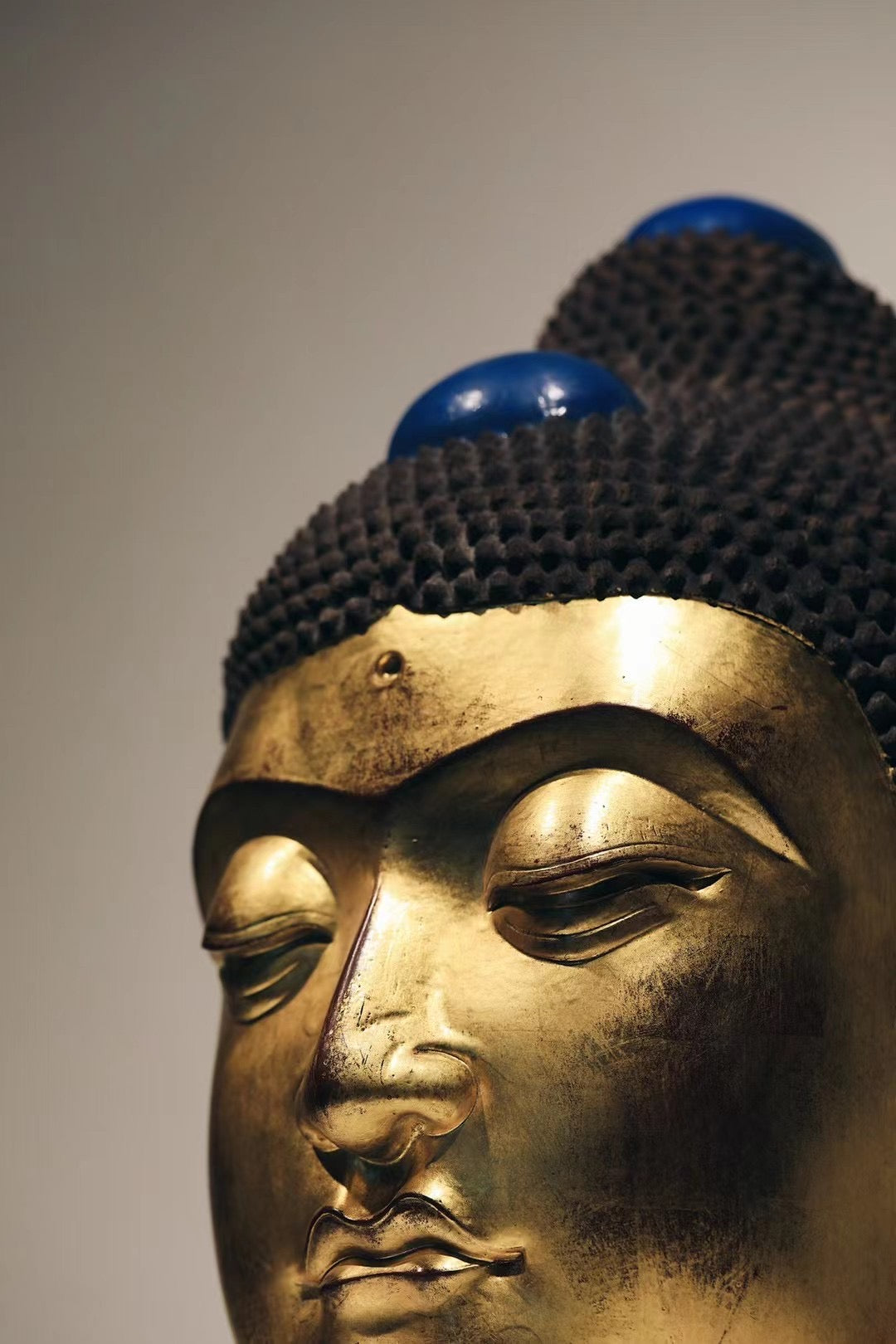 Ebony and Gold Leaf Buddha Head