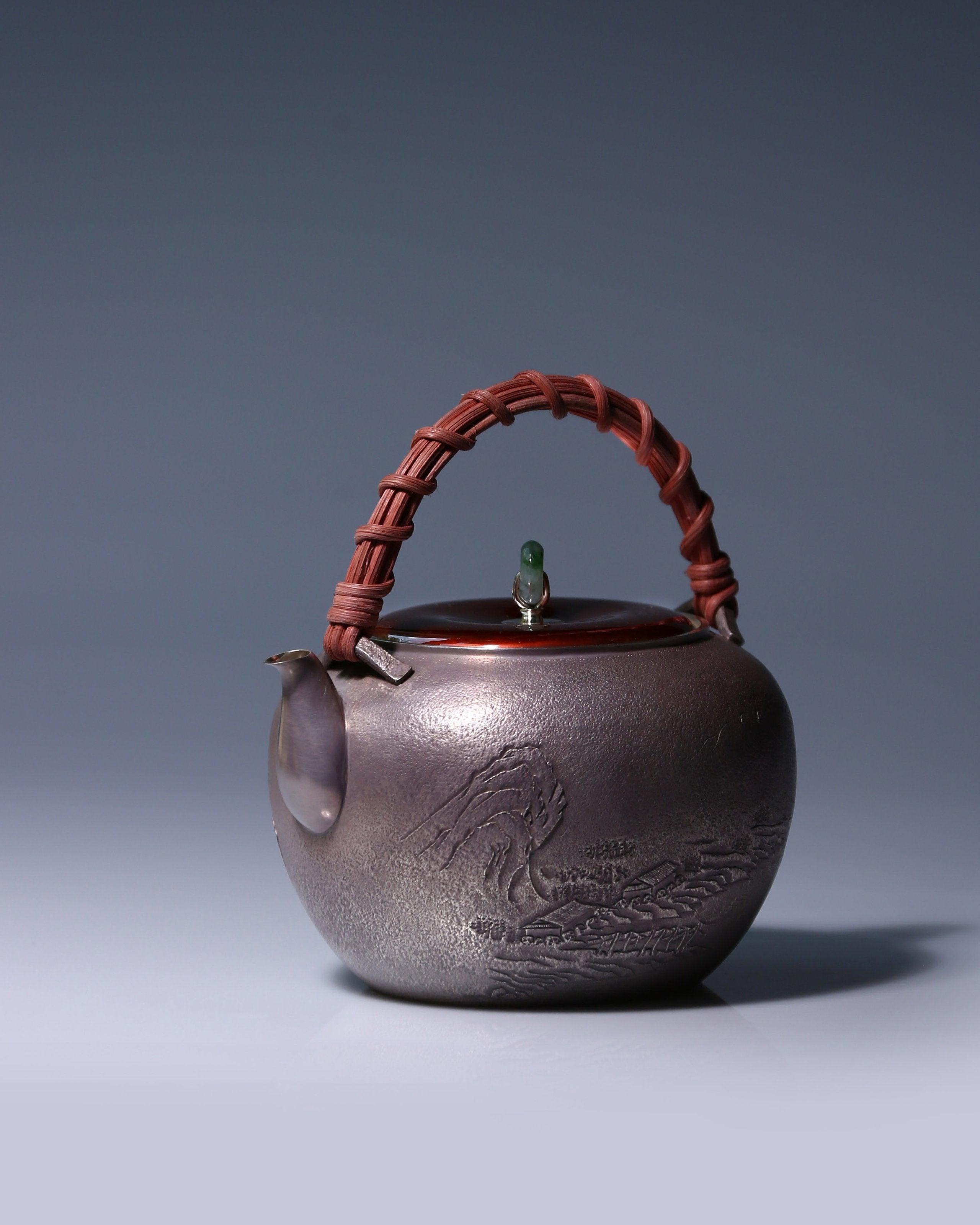 大雅堂制山水藤把紫皮純銀壺