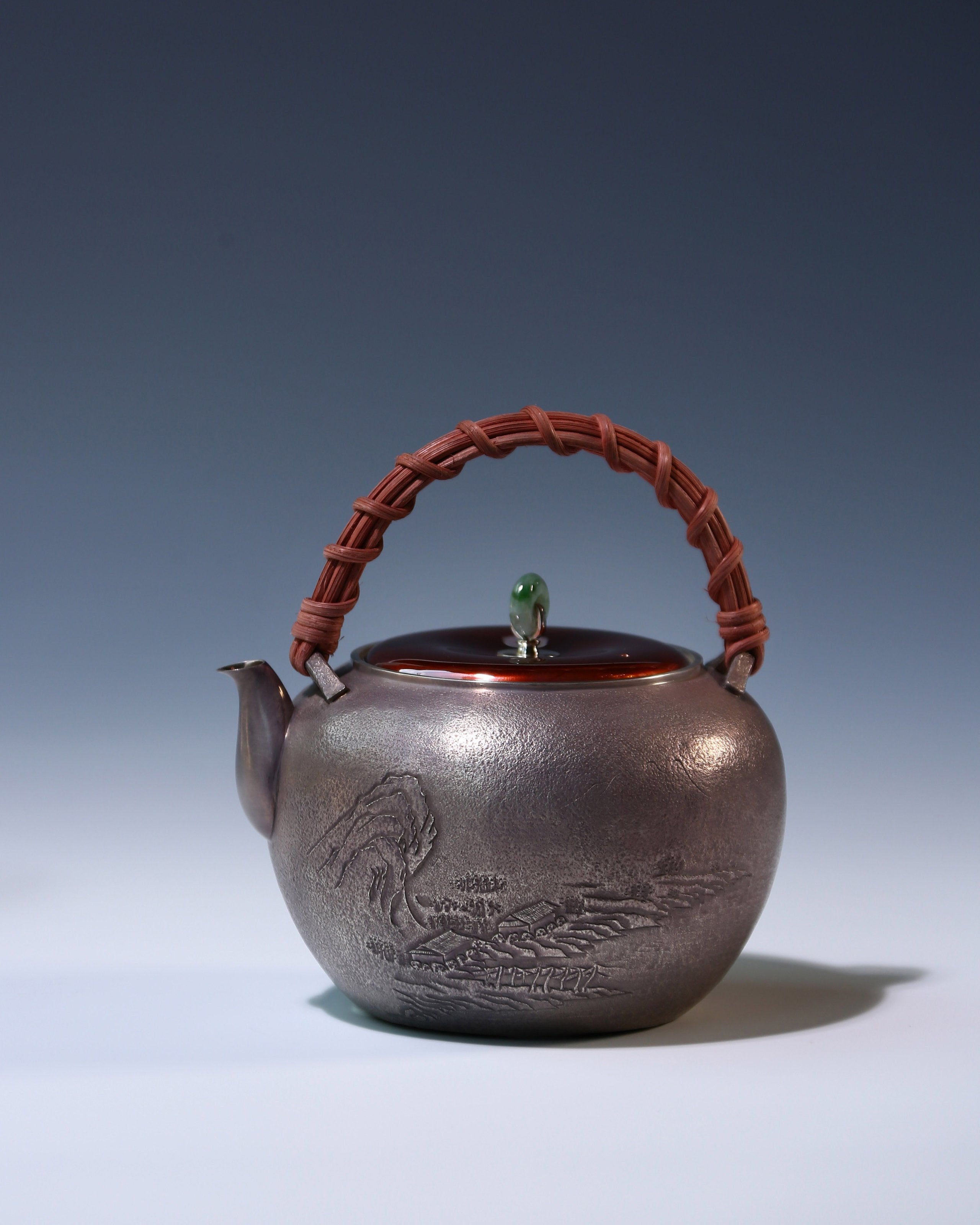 大雅堂制山水藤把紫皮純銀壺