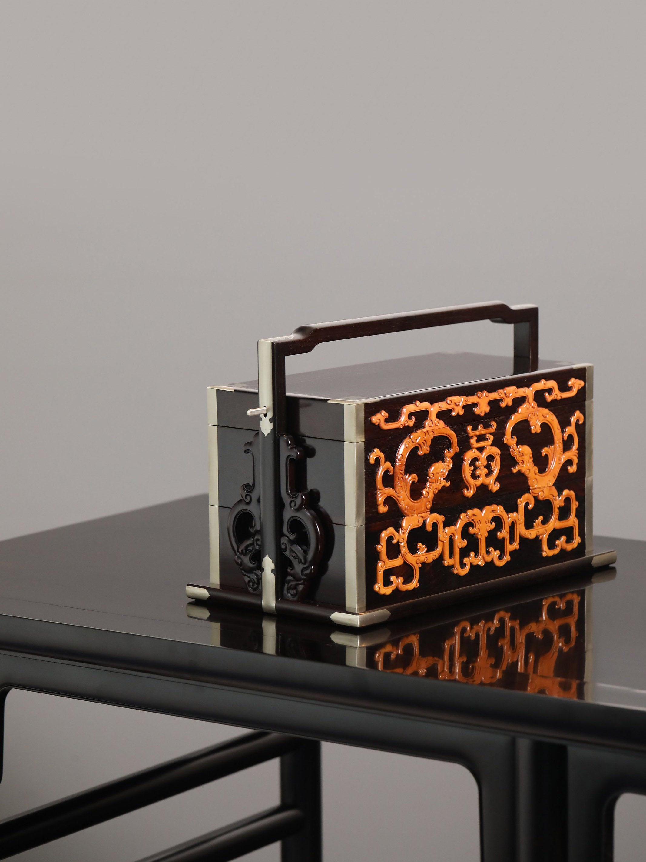 Double-layered box made of rosewood inlaid with boxwood dragons and longevity symbols