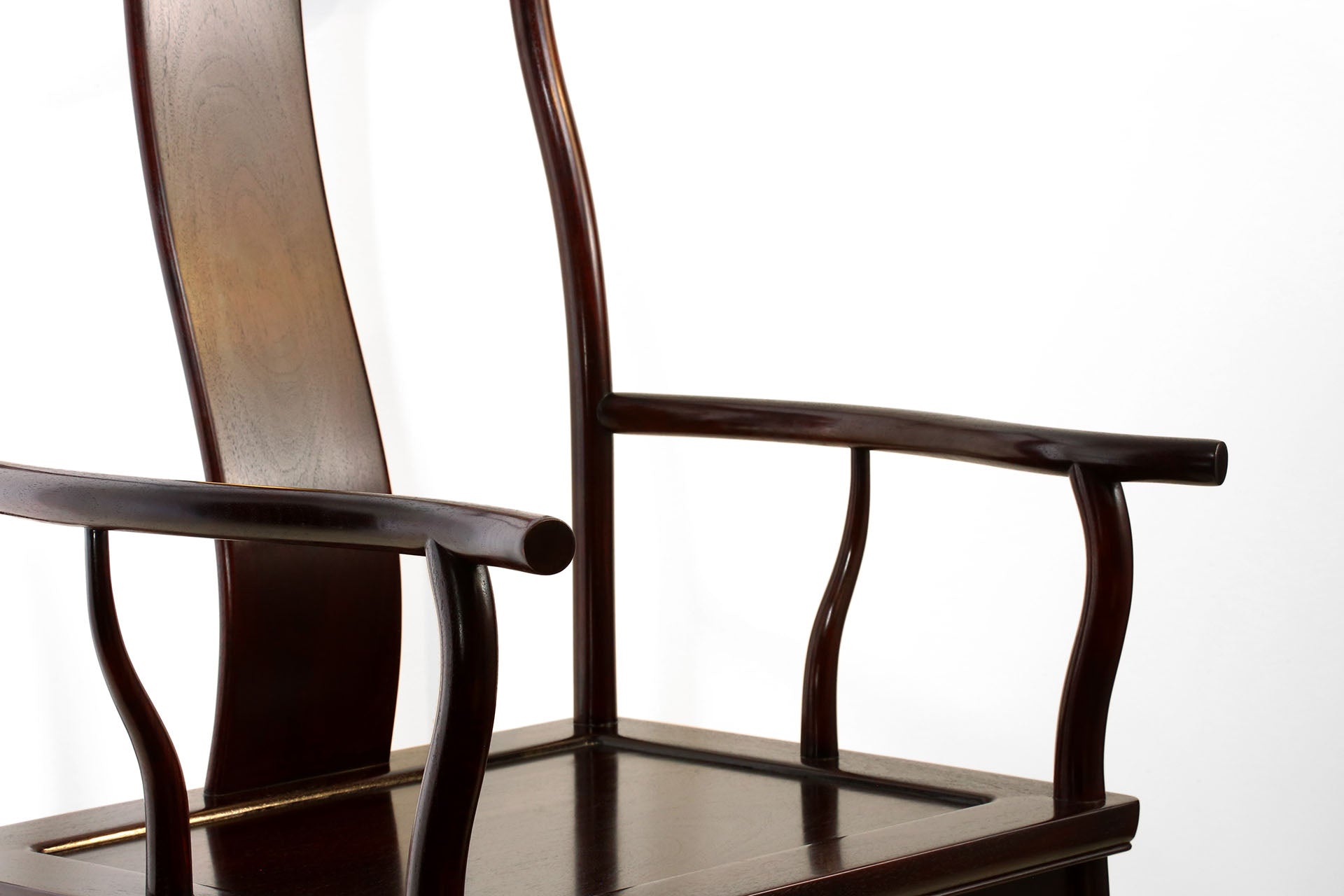 Zambian rosewood official's hat chair with four protruding ends