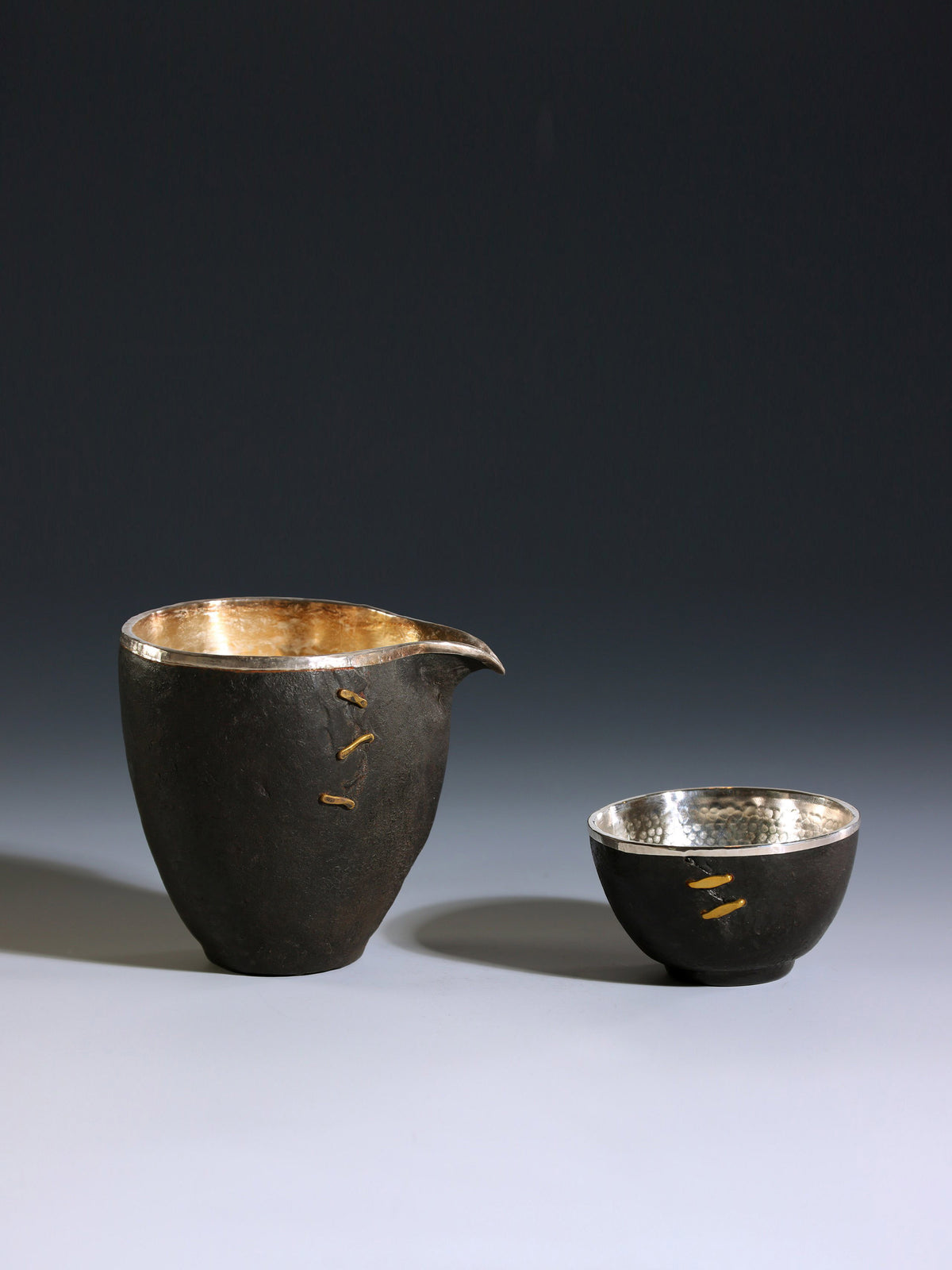 Iron-clad silver-studded fair cup