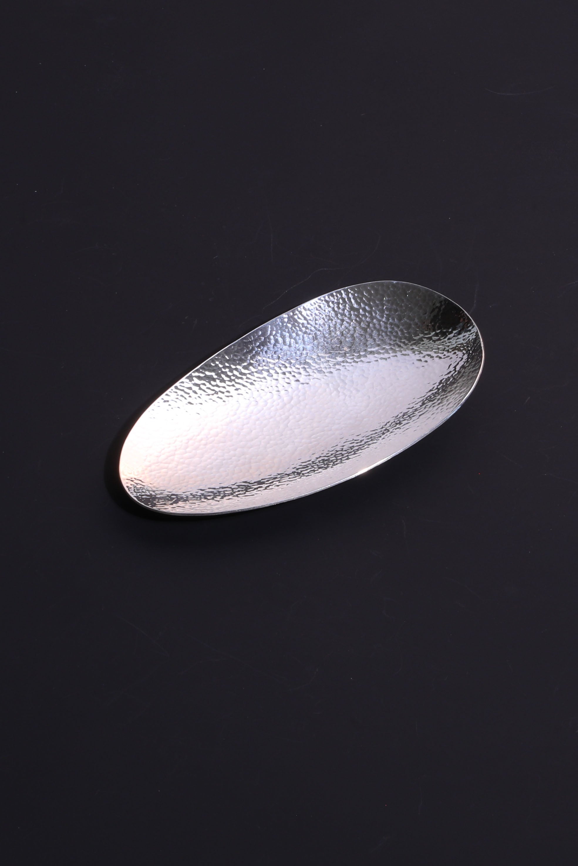A piece of silver tea scoop