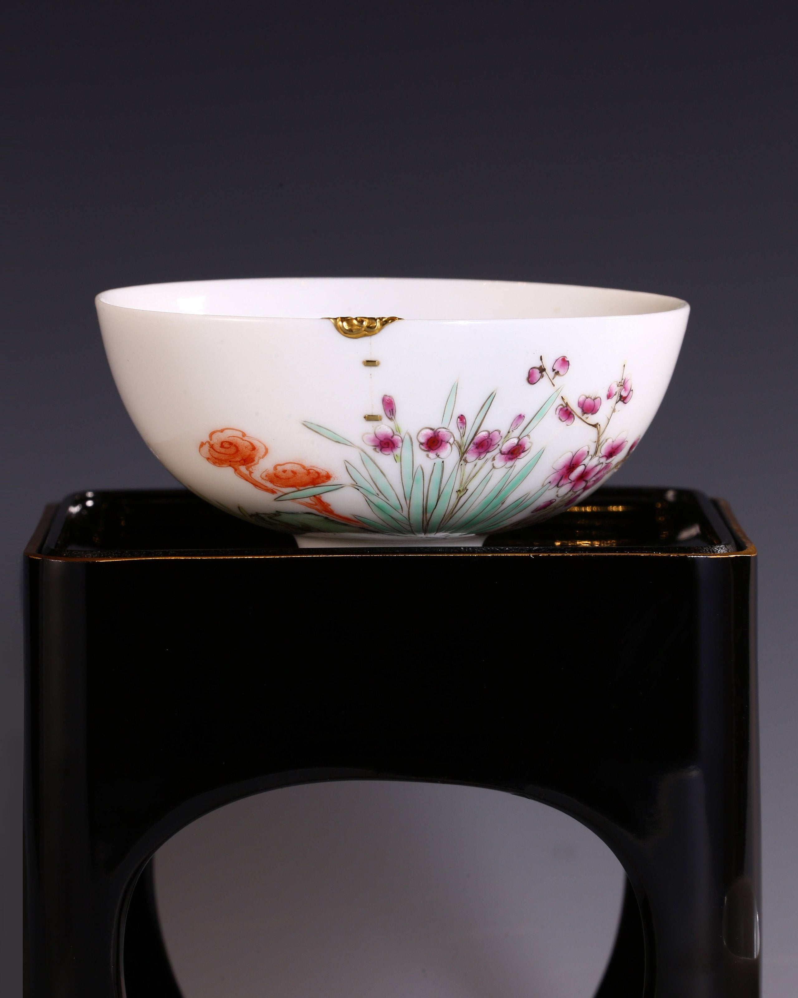 A pair of gilded famille rose palace bowls bearing the mark of the Yongzheng Emperor