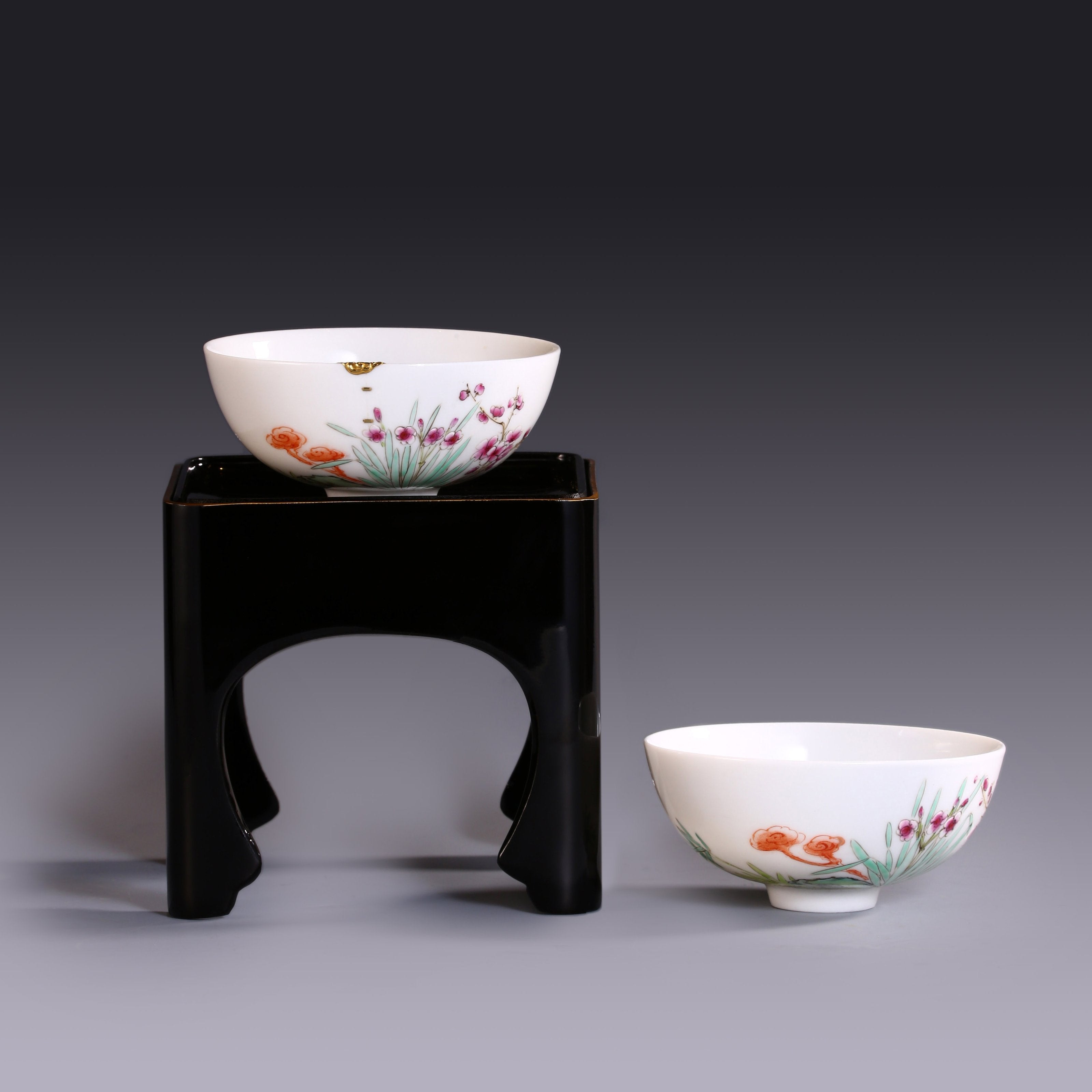 A pair of gilded famille rose palace bowls bearing the mark of the Yongzheng Emperor