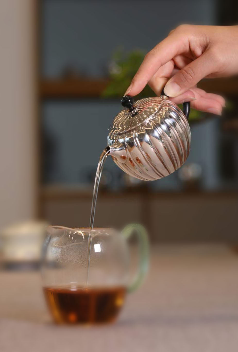 Jade-patterned sterling silver teapot