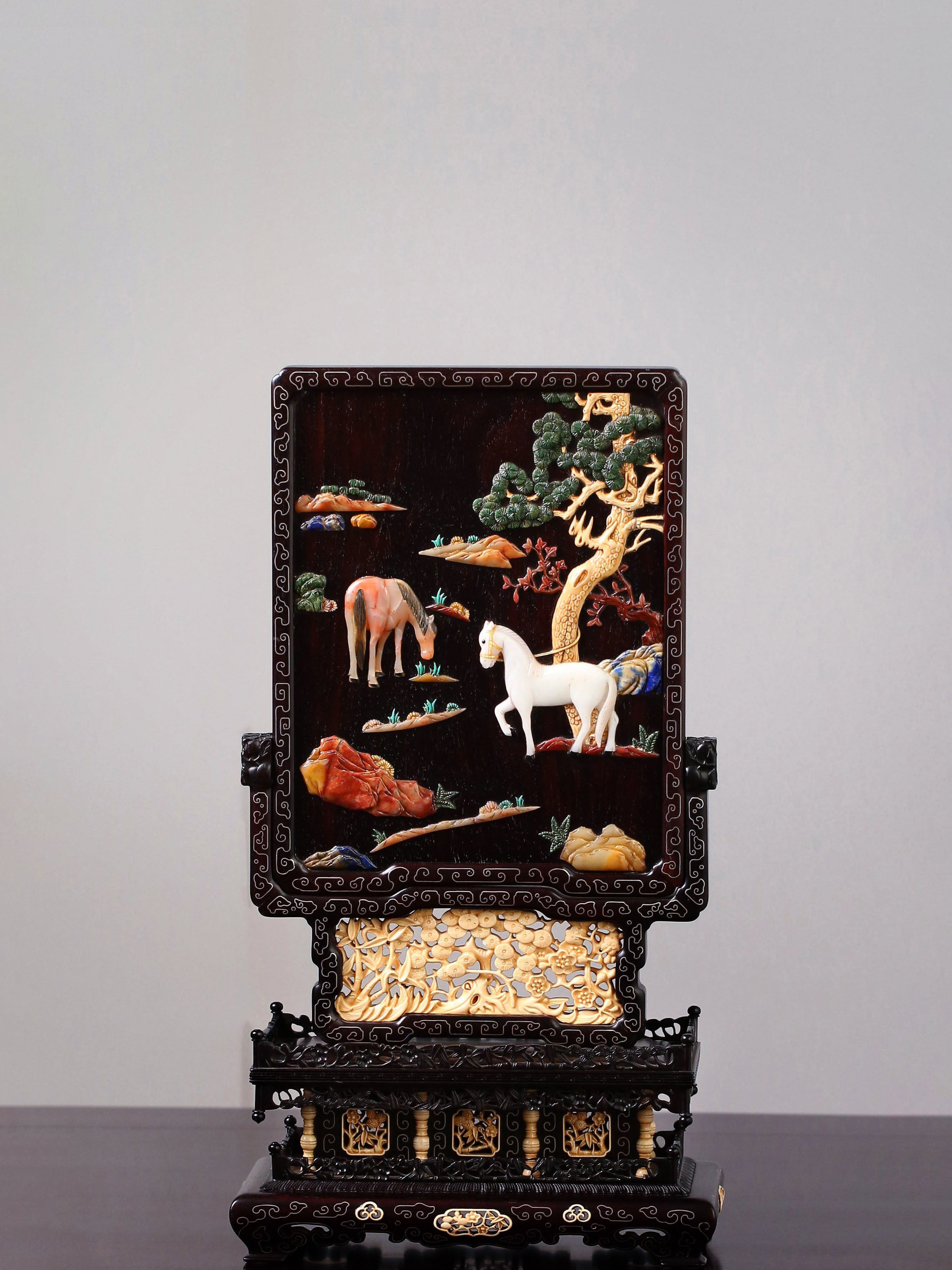 Rosewood screen inlaid with precious stones and mammoth ivory