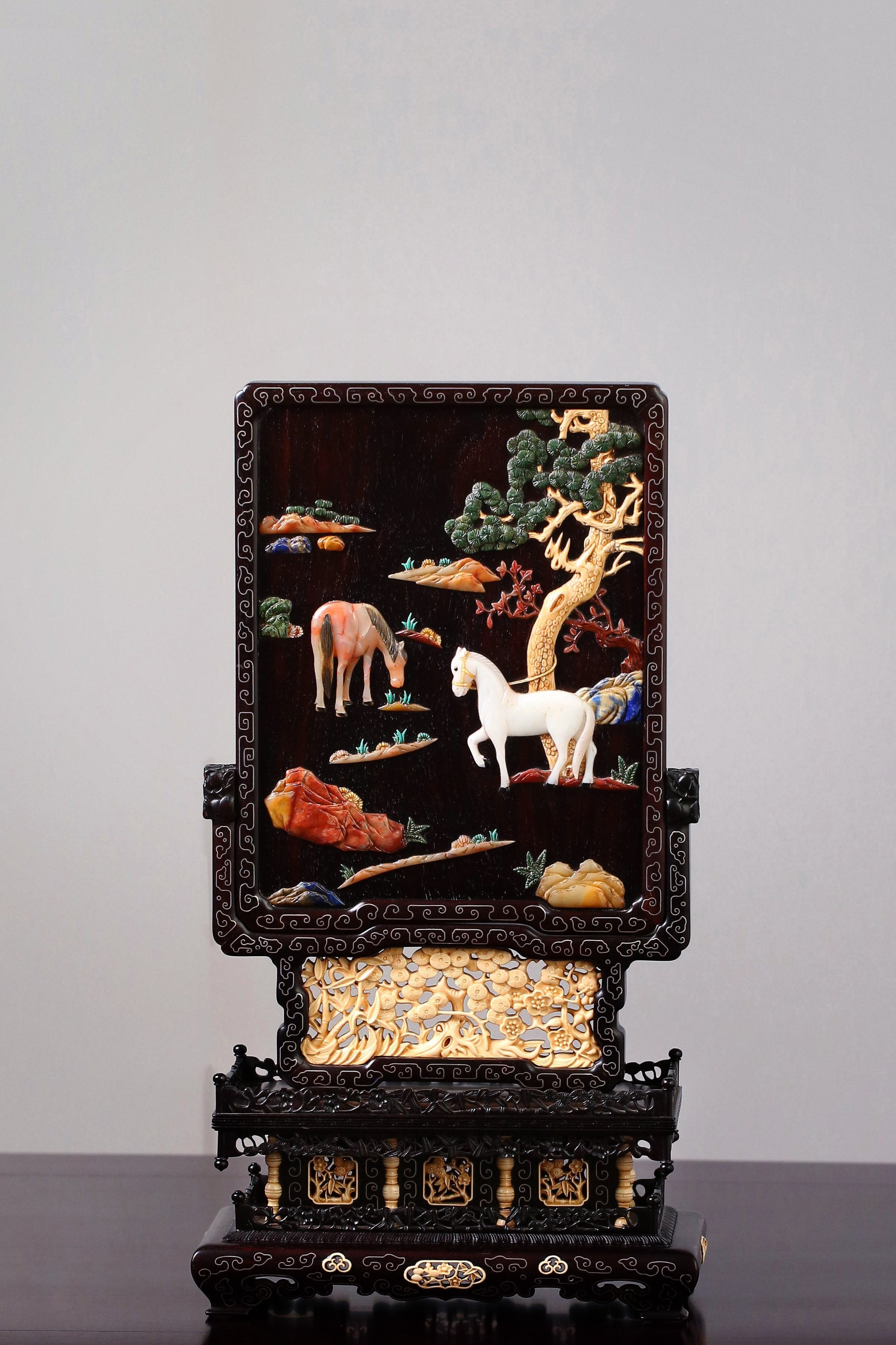 Rosewood screen inlaid with precious stones and mammoth ivory